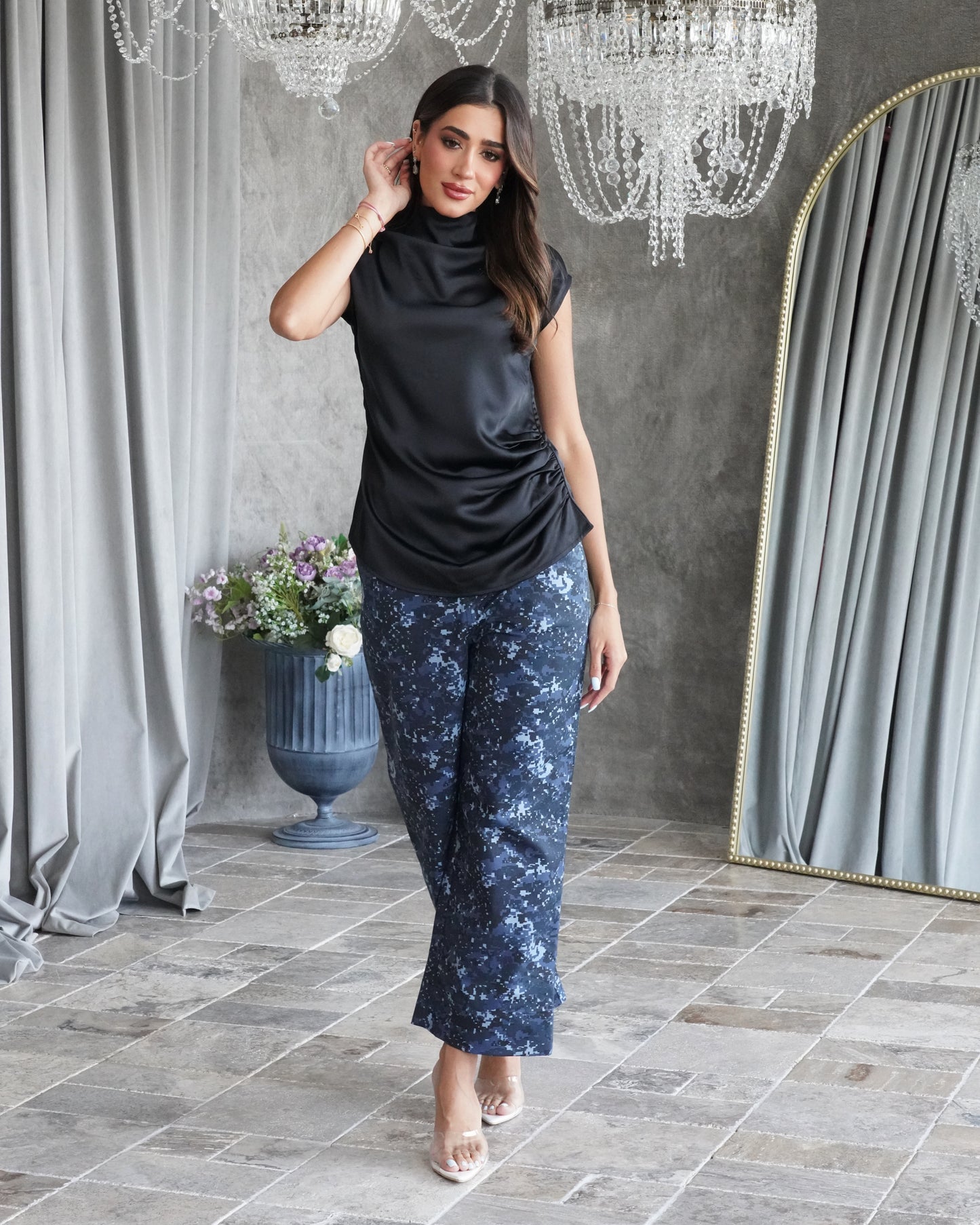 Black silk shirt with army print pants