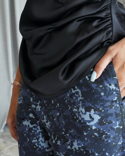 Black silk shirt with army print pants