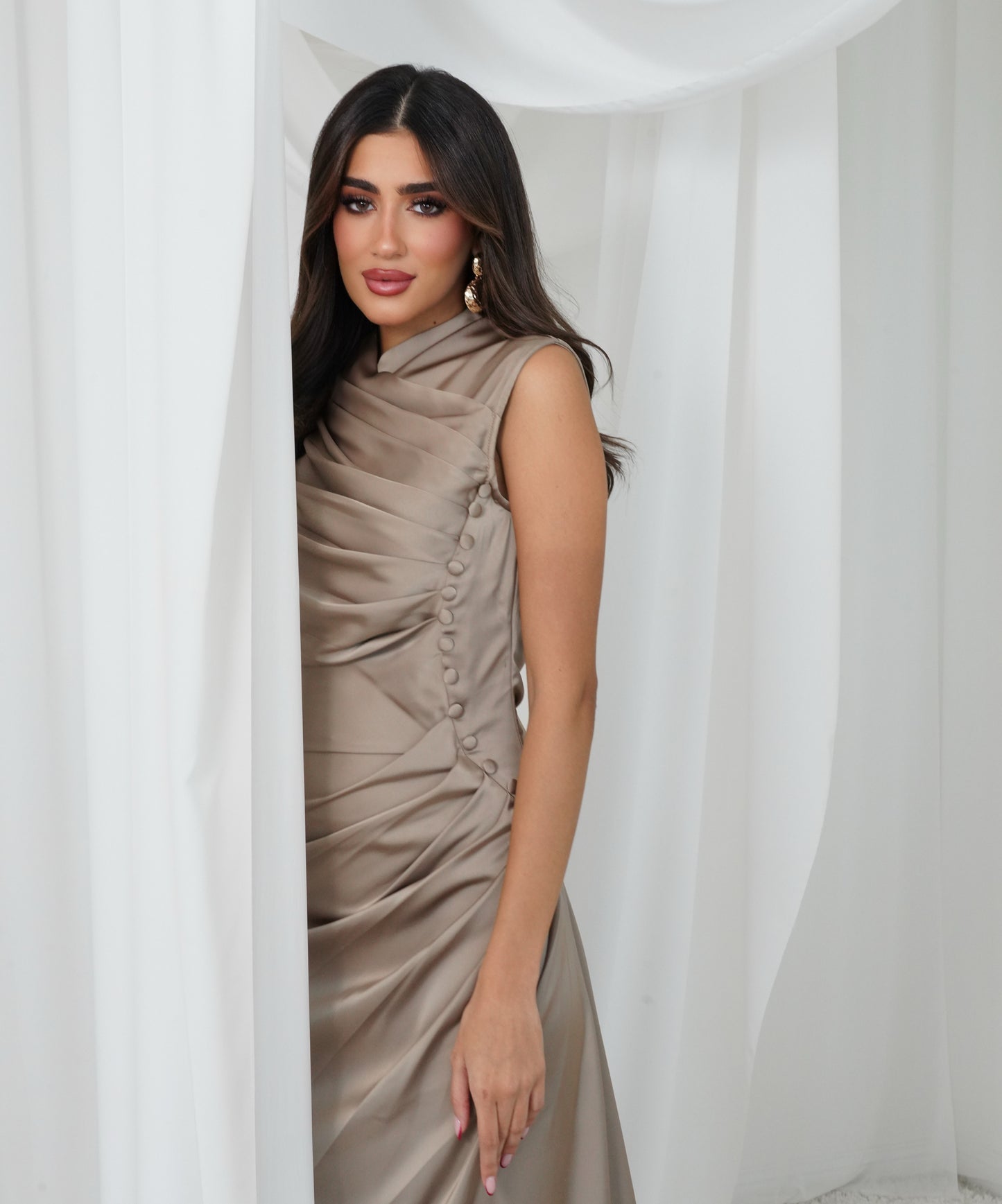 Golden dress with side pleats