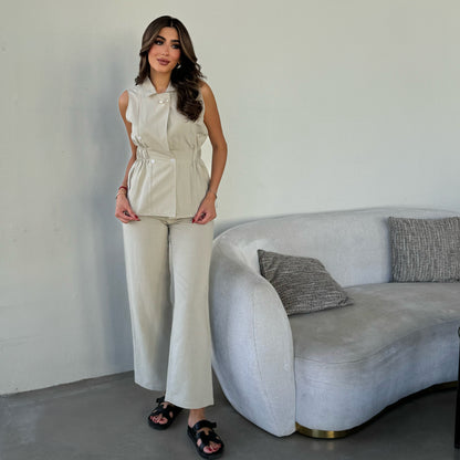 Beige suit with pearls